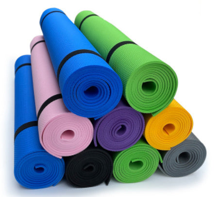 Yoga Mat Fitness Moisture-proof Thickened EVA in various colors stacked together for fitness and exercise.